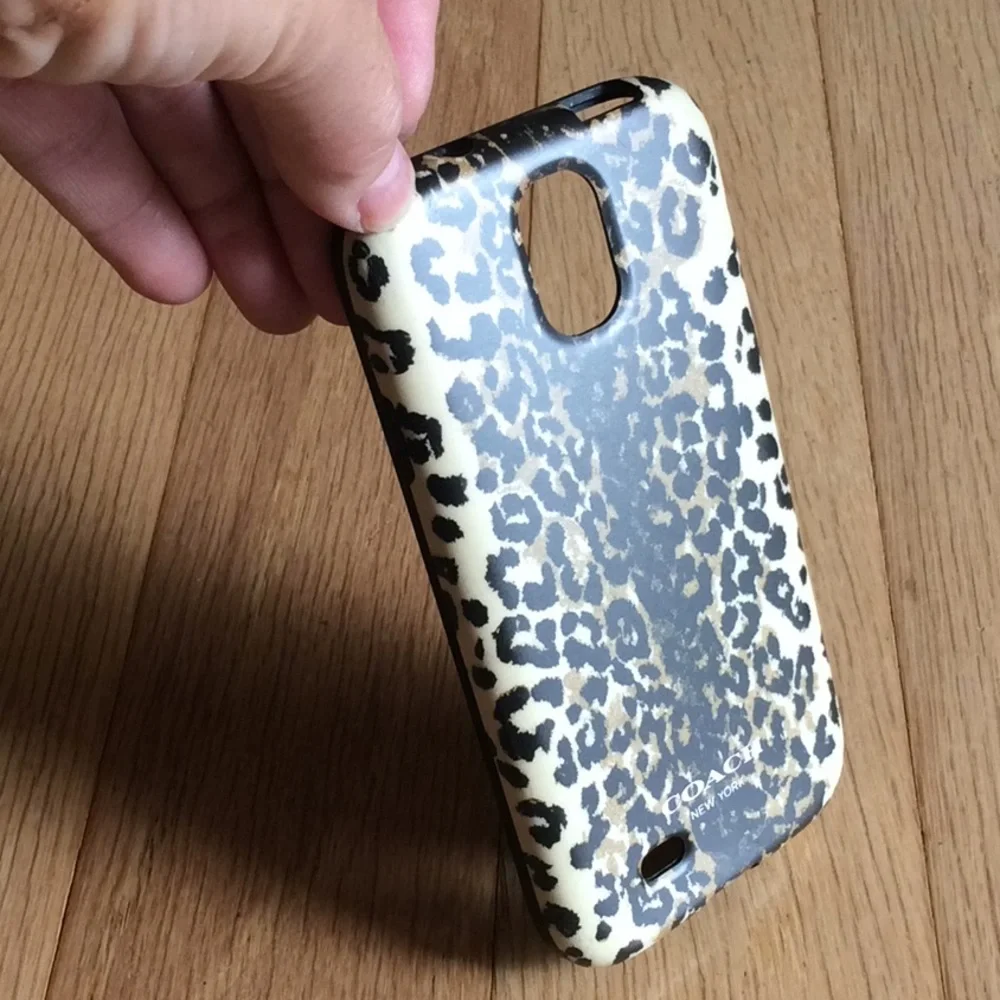 B1G1FREE Coach Cheetah print phone cover EUC